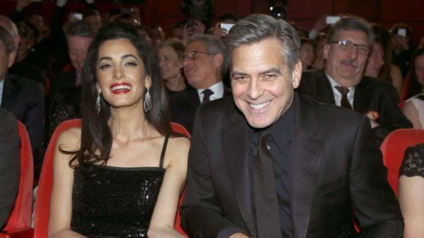 Amal e George Clooney cuore d'oro, "adottato" giovane rifugiato iracheno