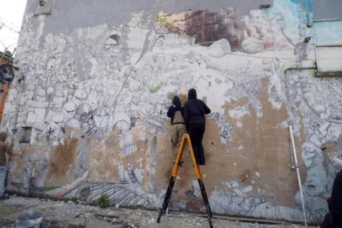 Bologna, "Blu" cancella i suoi murales