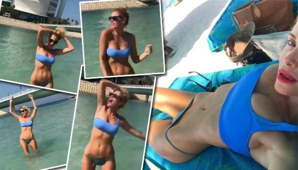 Alessia Marcuzzi, movimento sexy in bikini