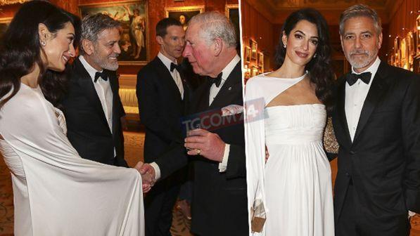 George Clooney e Amal, coppia regale alla corte del principe Carlo