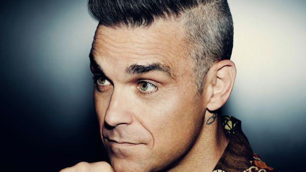 Robbie Williams ha detto sì, la reunion coi Take That il 25 febbraio