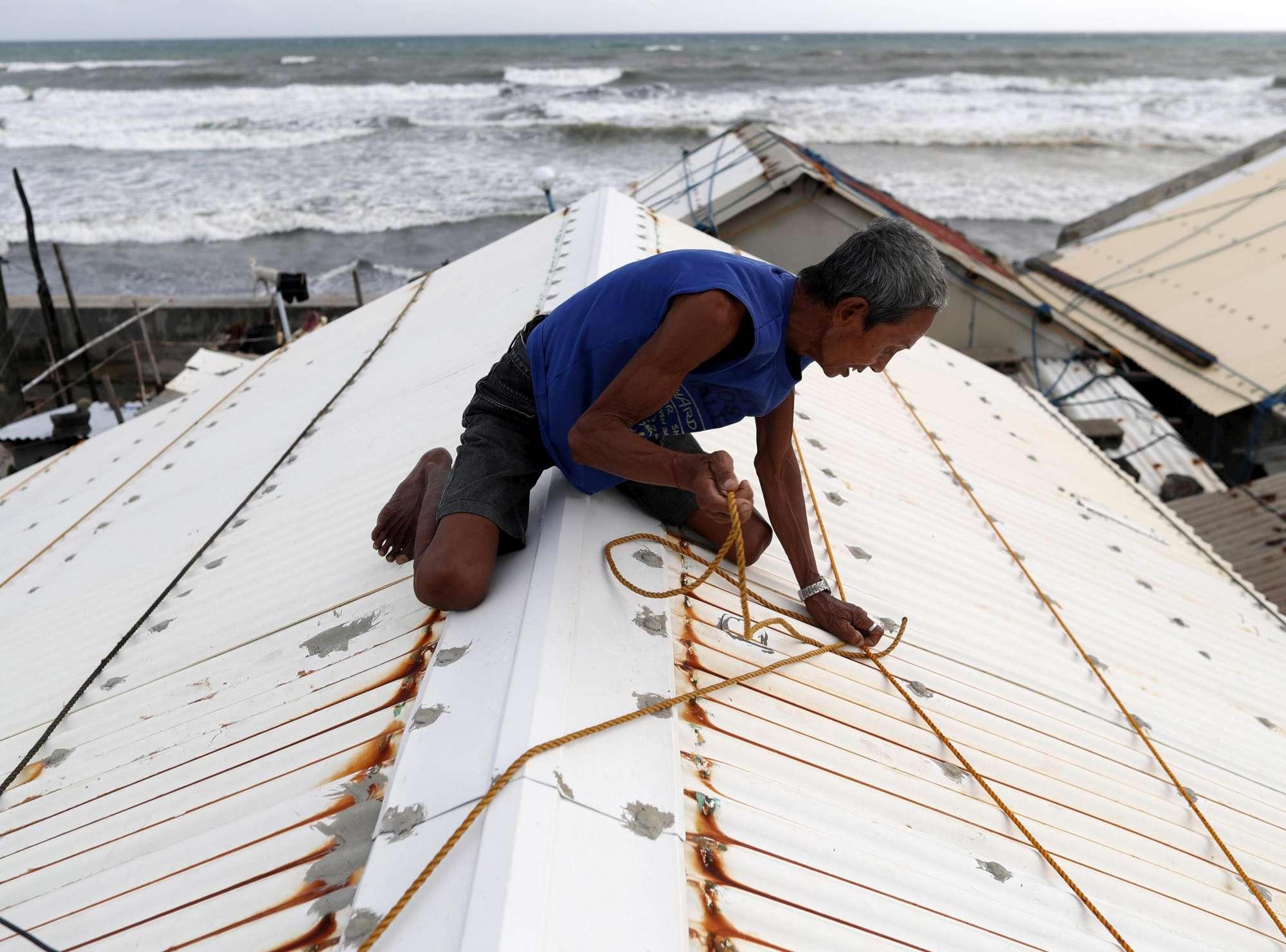 Tifone Mangkhut: almeno 16 le vittime e migliaia gli sfollati Tifone Mangkhut: almeno 16 le vittime e migliaia gli sfollati